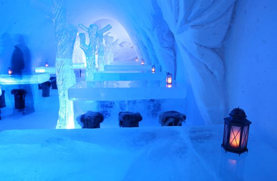 Lit snow hall inside the SnowCastle of Kemi on the Gulf of Bothnia shore