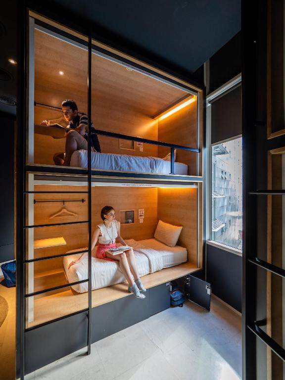 Capsule berths on a tower floor at The Bed KLCC in central Kuala Lumpur