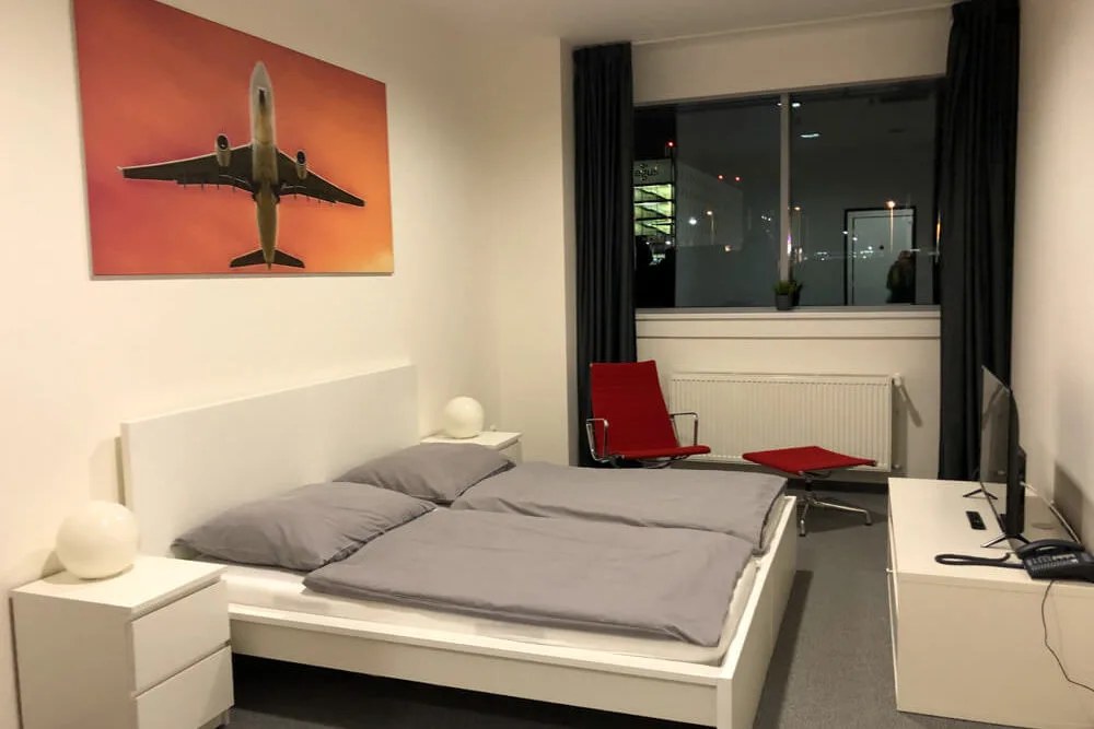 Compact windowless cabin interior at Aerorooms inside the terminal at Prague Airport